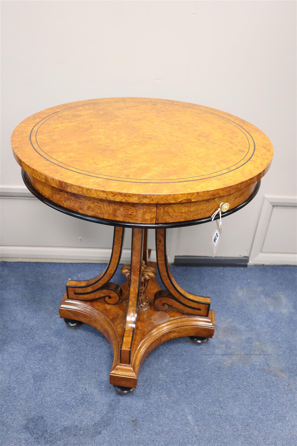 A reproduction circular Biedermeier style birds eye maple centre table, 64cm diameter, 74cm high